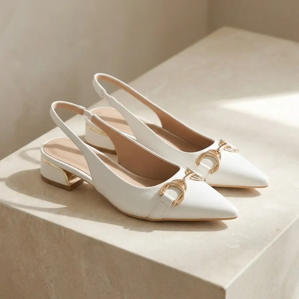White pointed-toe slingback block heels
