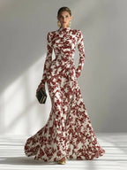 Model wearing the abstract floral mermaid maxi dress in Blue