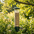 Squirrel-proof bird feeder in a garden