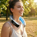 Person wearing the portable hands-free neck fan outdoors on a warm day