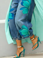 Floral-print wide-leg jeans detail