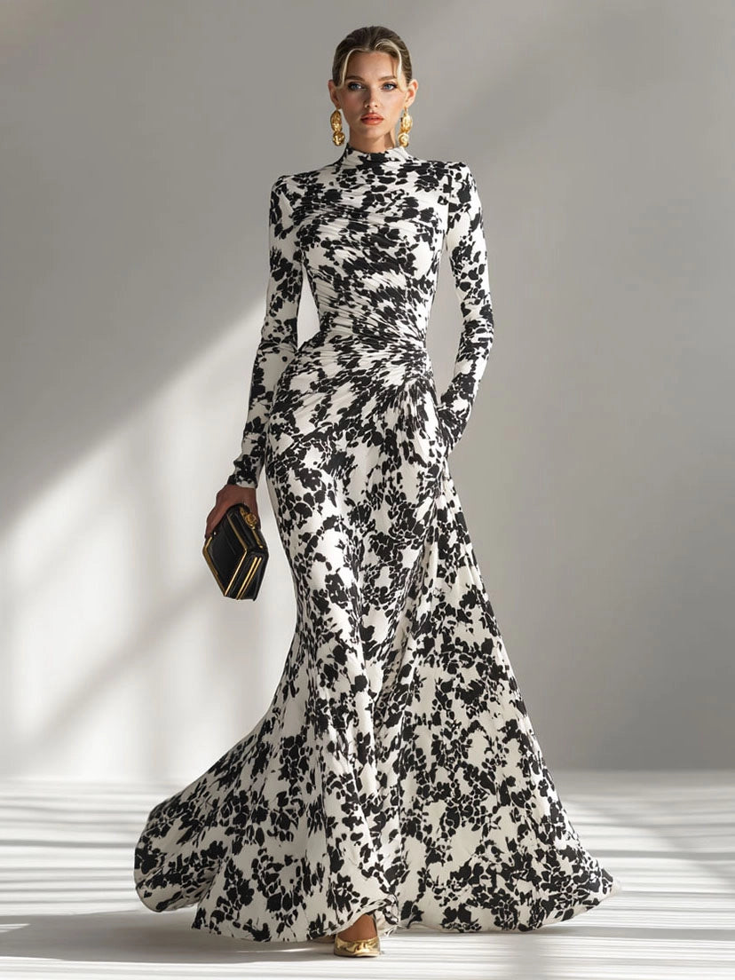 Model wearing the abstract floral mermaid maxi dress in Red