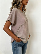 Fringed short-sleeve top detail