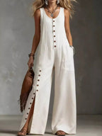 Model in off-white linen maxi dress