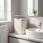 Hands-free smart trash can in a modern bathroom