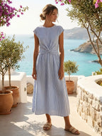 Model in Belgian linen twist-front midi dress