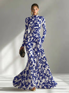 Model wearing the abstract floral mermaid maxi dress in Black