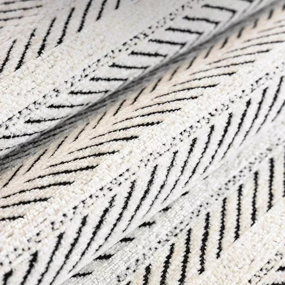 Herringbone scallop-edge sofa cover detail