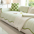 Herringbone scallop-edge sofa cover detail