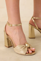Women's Charmed I'm Sure Gold Woven Bow Block Heel Sandals | Heel measures 3.75" 1