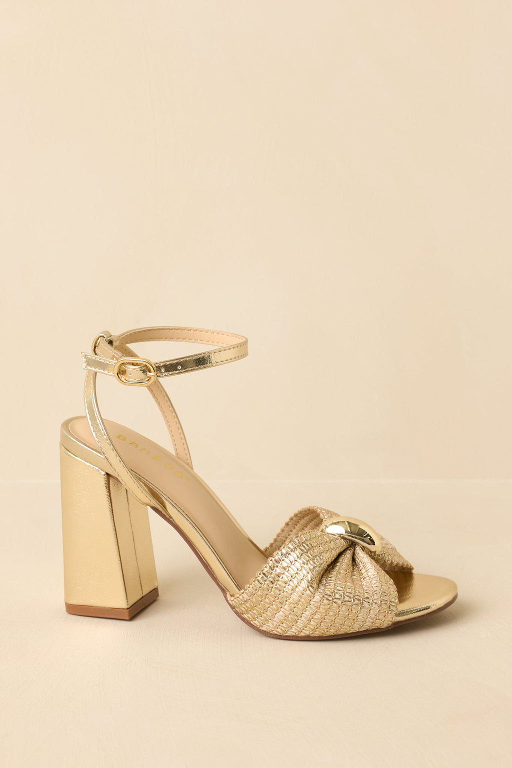 Women's Charmed I'm Sure Gold Woven Bow Block Heel Sandals | Heel measures 3.75" 2