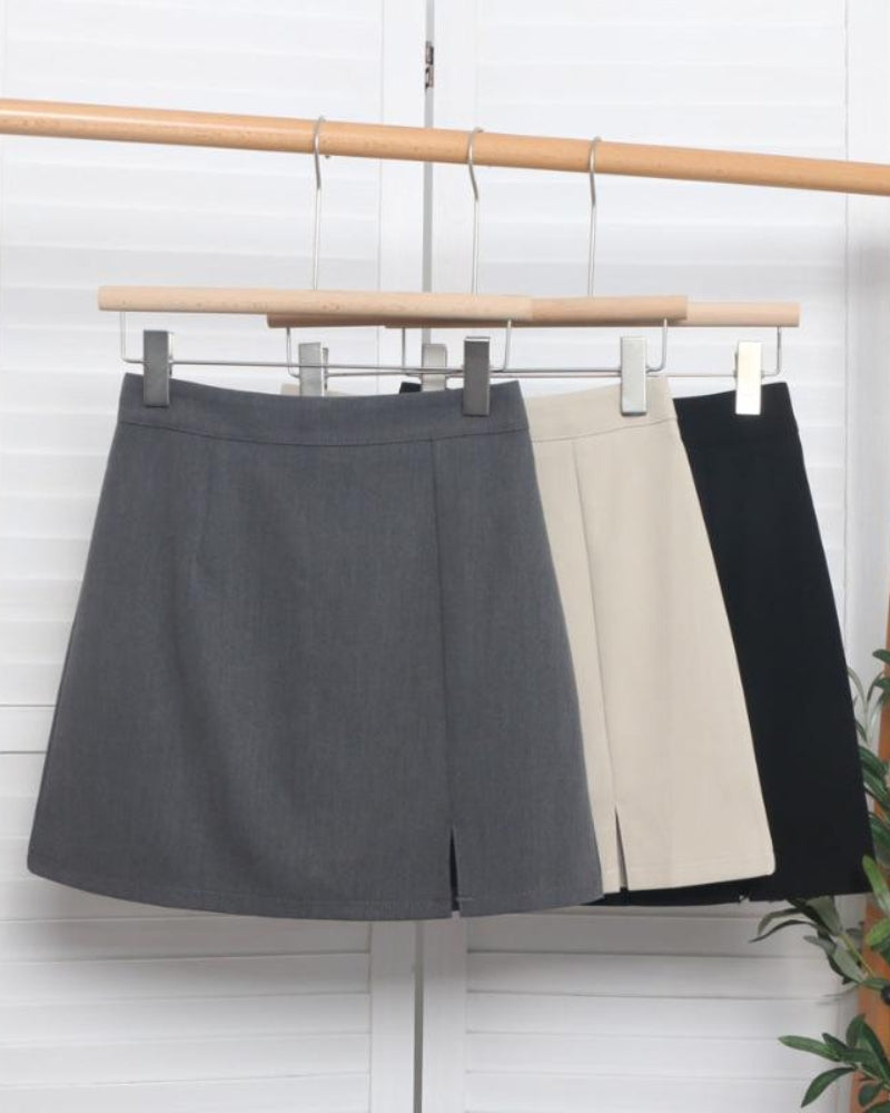 Chic Collection | Black Mini Skirt with Tailored Design & Side Slit | Versatile Style for Office and Evening