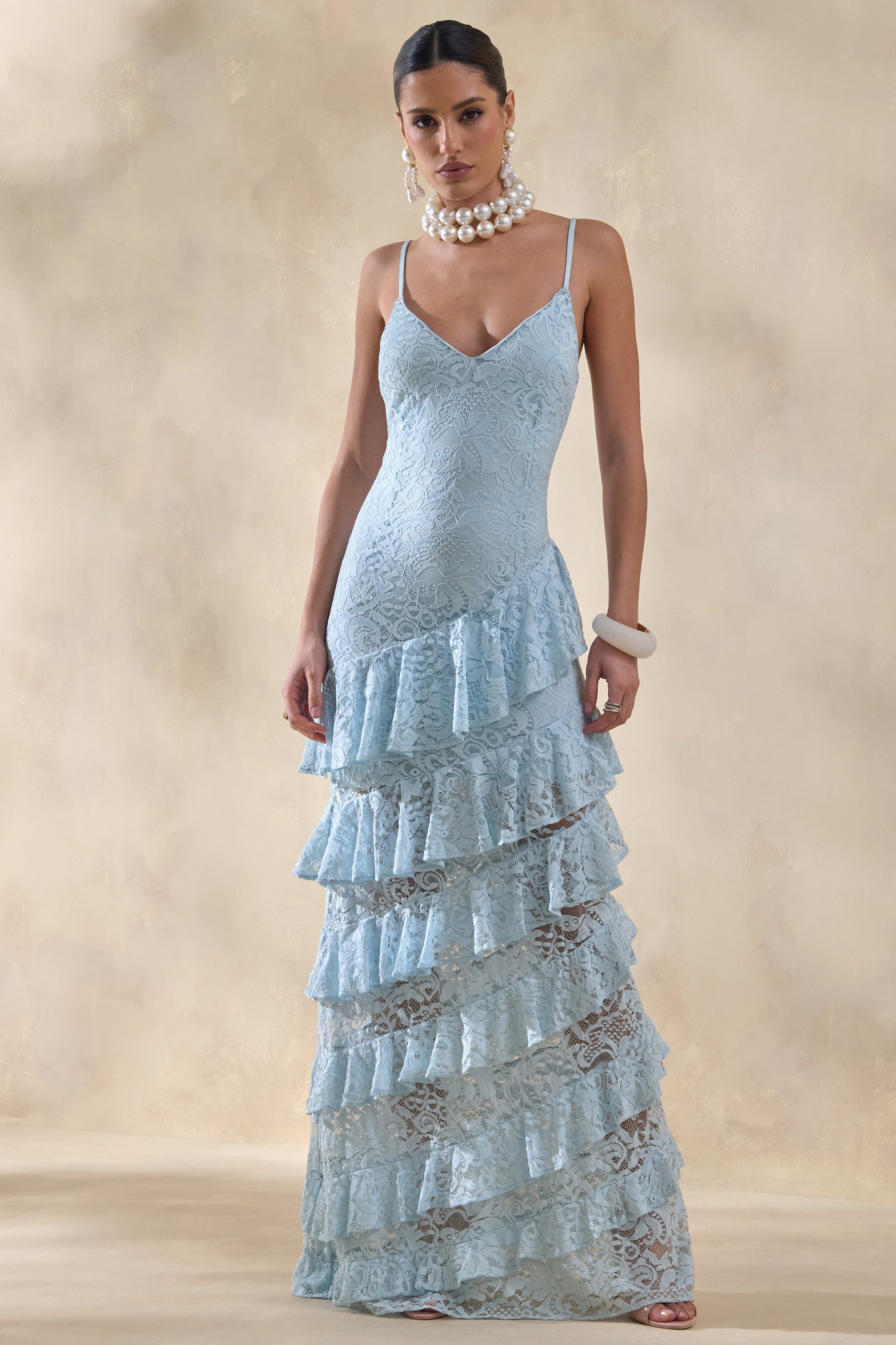 Elegant Blue Lace Maxi Dress with Deep V Neckline & Ruffled Skirt for Stunning Occasions