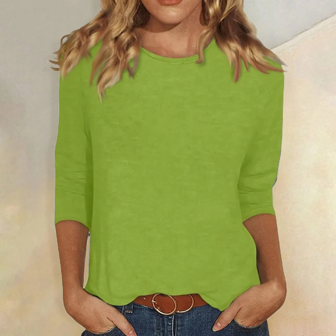 Versatile 3/4-sleeve top in a solid shade, full view