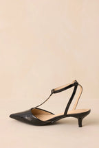 Women's Had To Be There Black Patent Faux Leather T-Strap Heels | Heel measures 2" 4