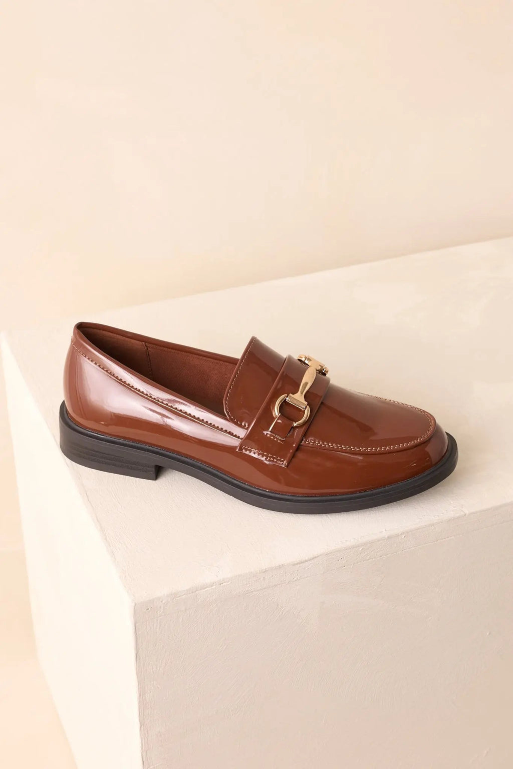 Women's It All Made Sense Brown Patent Faux Leather Loafers | Heel measures 1" 3