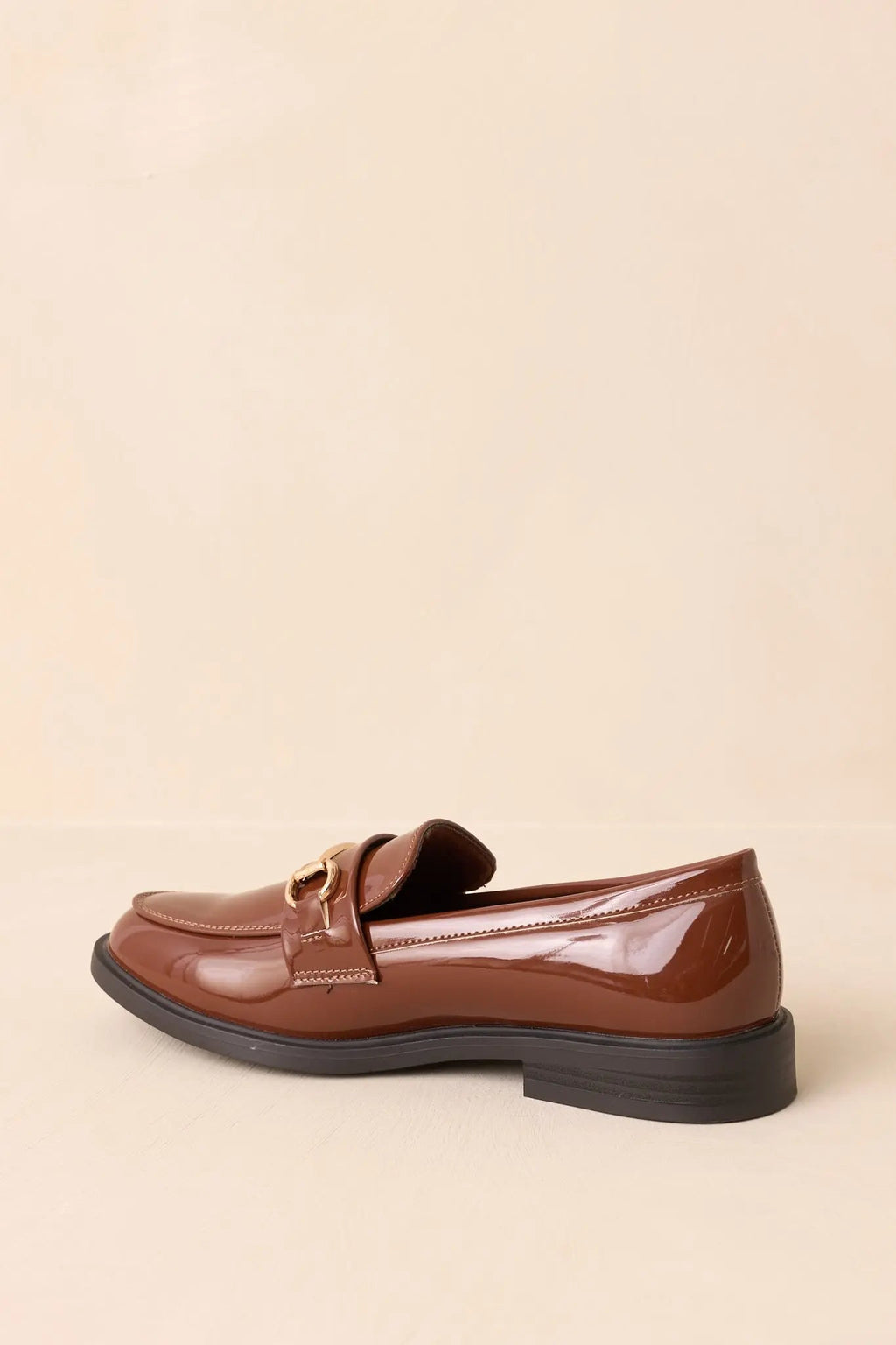Women's It All Made Sense Brown Patent Faux Leather Loafers | Heel measures 1" 7