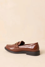 Women's It All Made Sense Brown Patent Faux Leather Loafers | Heel measures 1" 7