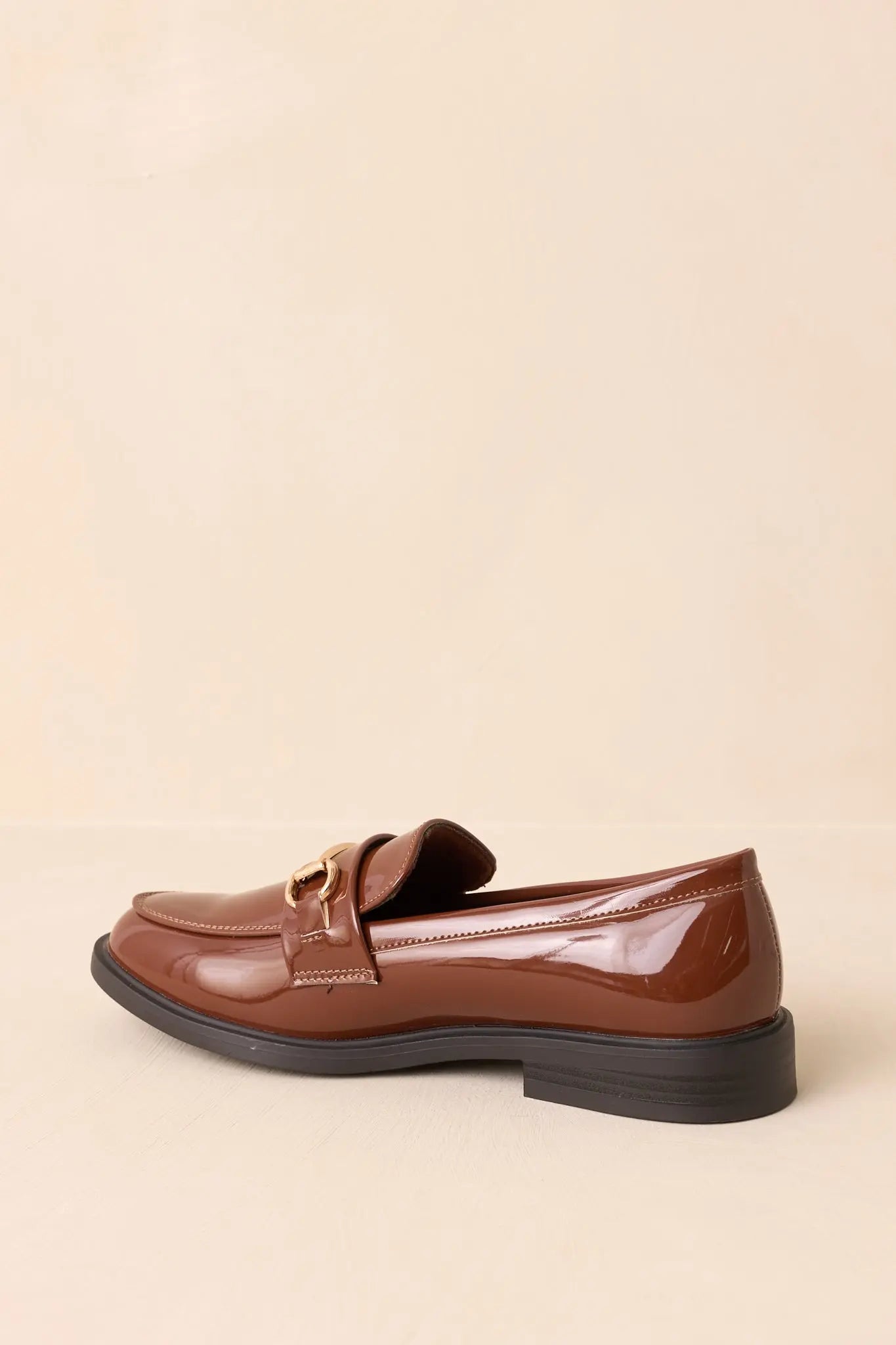 Women's It All Made Sense Brown Patent Faux Leather Loafers | Heel measures 1" 7