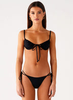 Women's Jaiya Collection | Black Bikini Bottom with Ruched Waistband | Adjustable Fit for Flattering Beach Style | Side  1