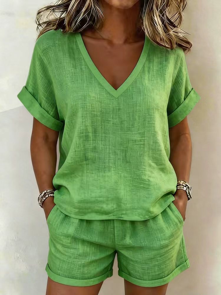 Green V-neck top and cuffed shorts two-piece set