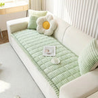 Plush pleated-edge sofa cover detail