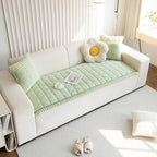 Plush pleated-edge sofa cover detail