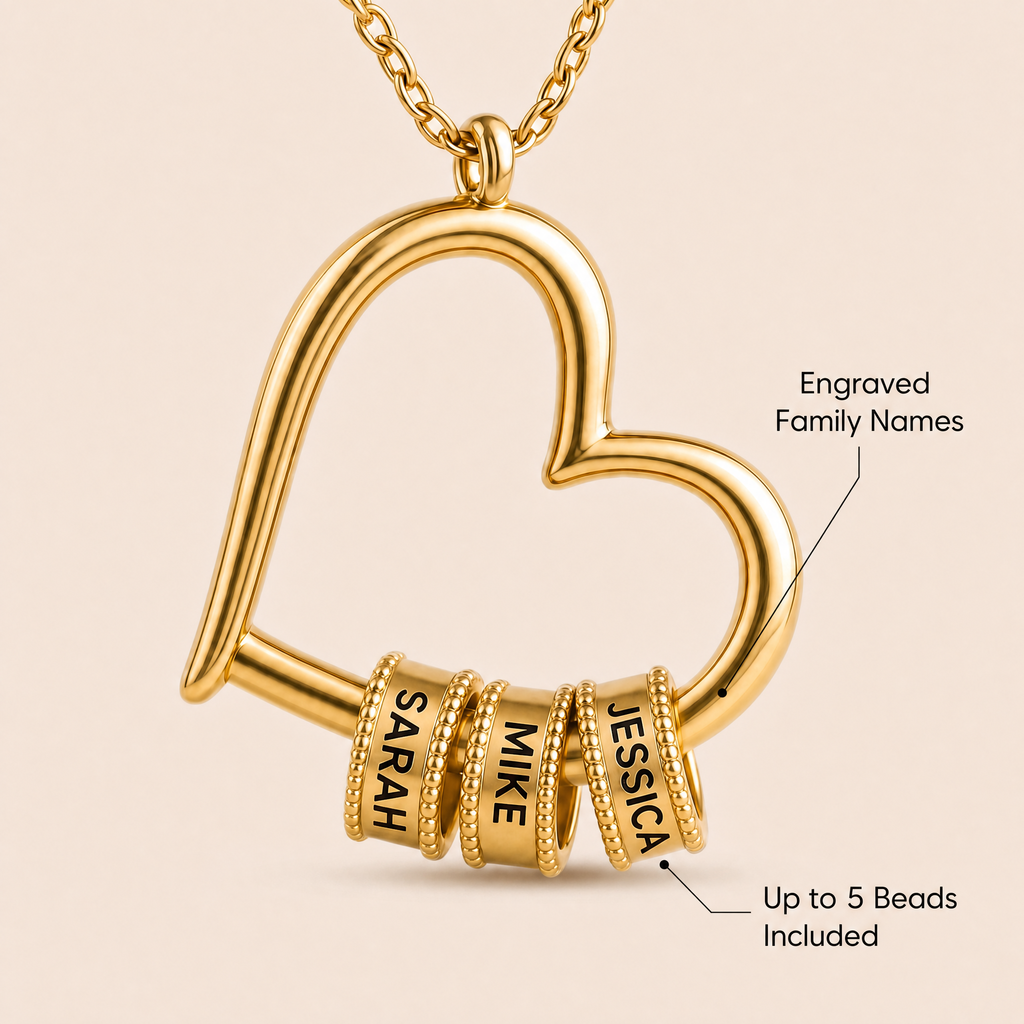 Close-up of engraved name beads on necklace