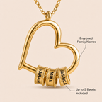 Close-up of engraved name beads on necklace