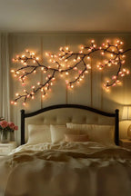 Decorative lighted vine branch detail