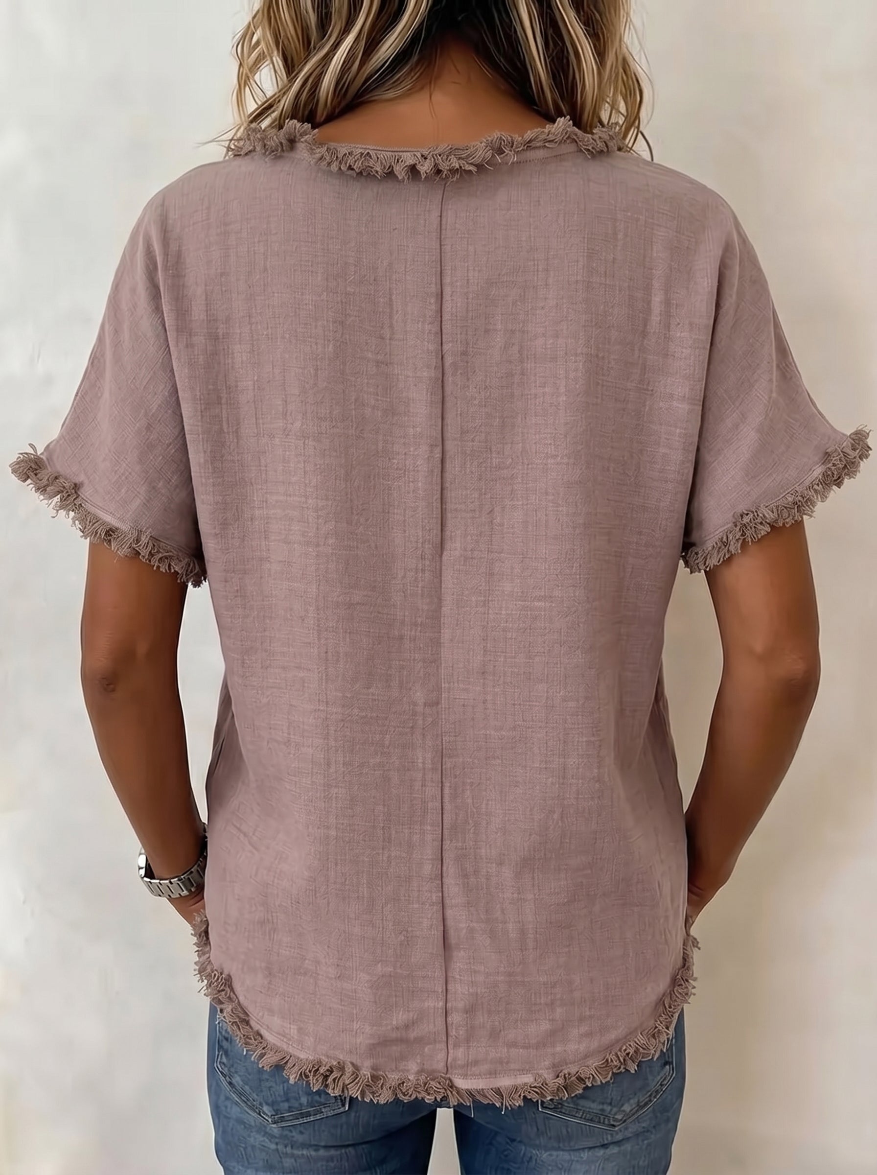 Fringed short-sleeve top detail