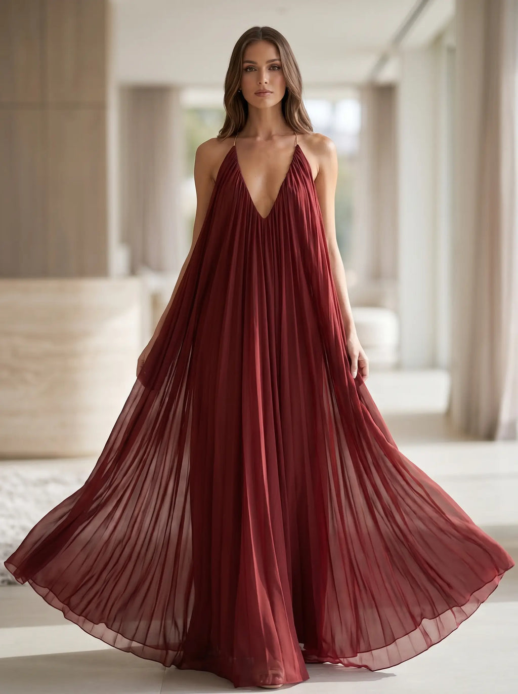 Model wearing the elegant V-neck chiffon flowy maxi dress in Deep Red