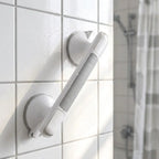 Shower grab bar on bathroom wall