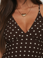Nellie Collection | Women's Polka Dot Mini Dress with Tie-Back Design | Stylish V-Neck for Effortless Elegance