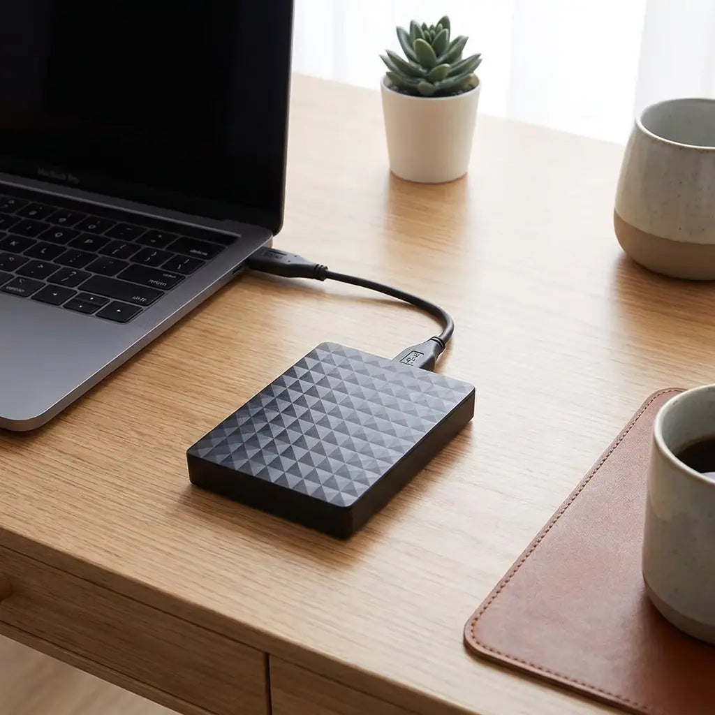 Portable external hard drive on desk