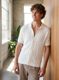 Male model in white knit shirt