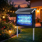 Solar bug zapper glowing in a backyard at dusk