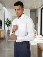 Male model wearing the men's white linen dress shirt, comfort fit, soft natural light