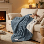 Ribbed flannel heated blanket on a sofa