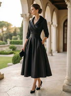 Model wearing the satin draped-collar formal dress