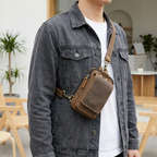 Full-grain leather waist pack worn across the body