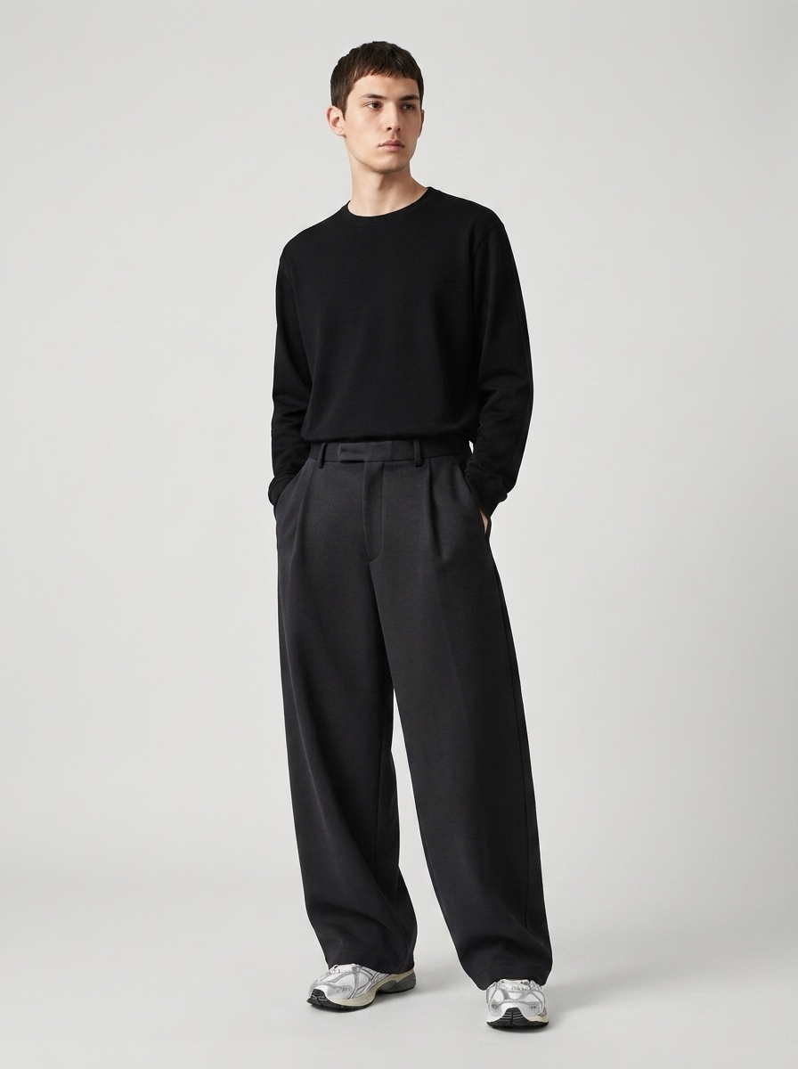 Male model wearing oversized wide-leg sweatpants, relaxed jogger fit