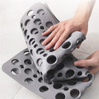 Shower mat laid flat showing full surface