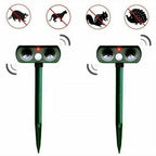 Pest repeller staked in garden