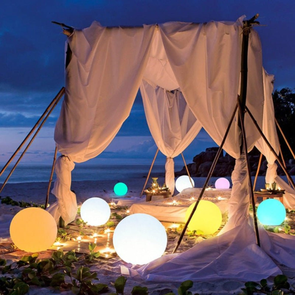 Glowing globe light in garden