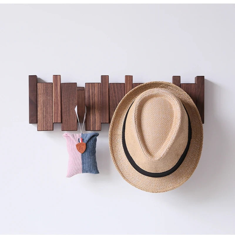 Wooden piano-shaped coat rack detail