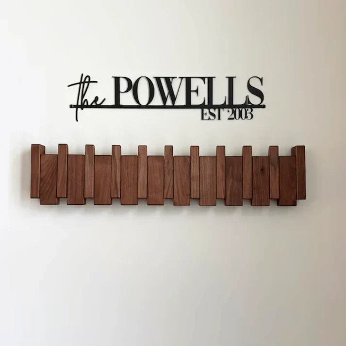 Wooden piano-shaped coat rack with hooks