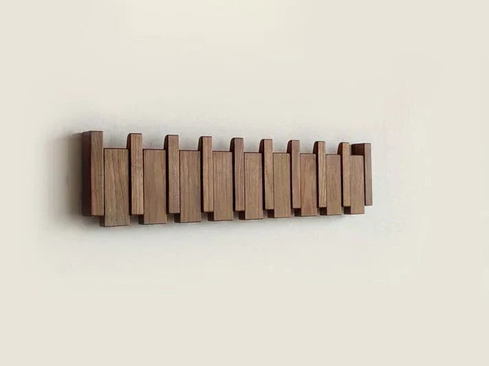 Wooden piano-shaped coat rack lifestyle